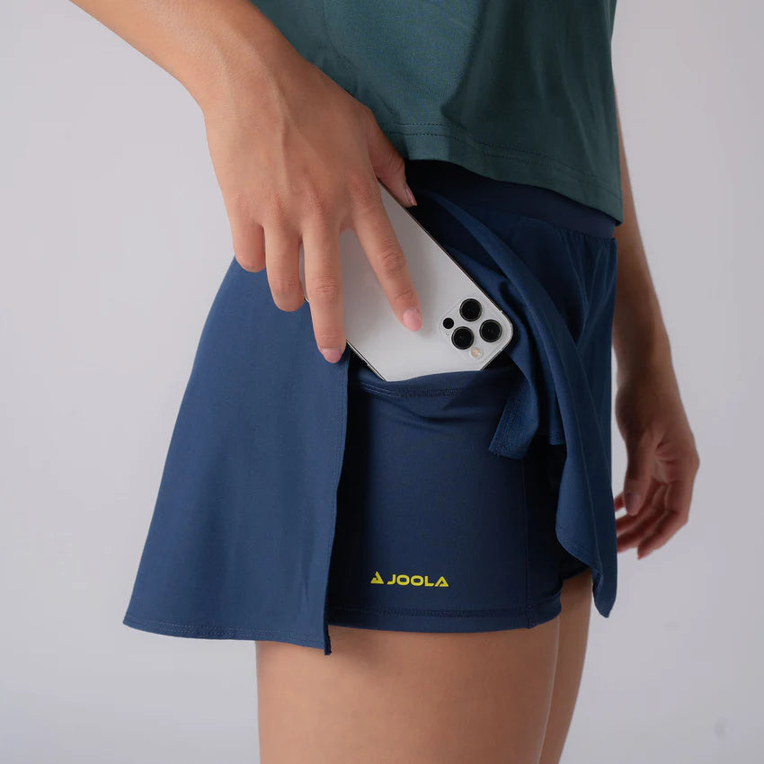 Side view of Joola Women's Pickleball Skort in navy, ensuring a comfortable and athletic fit.